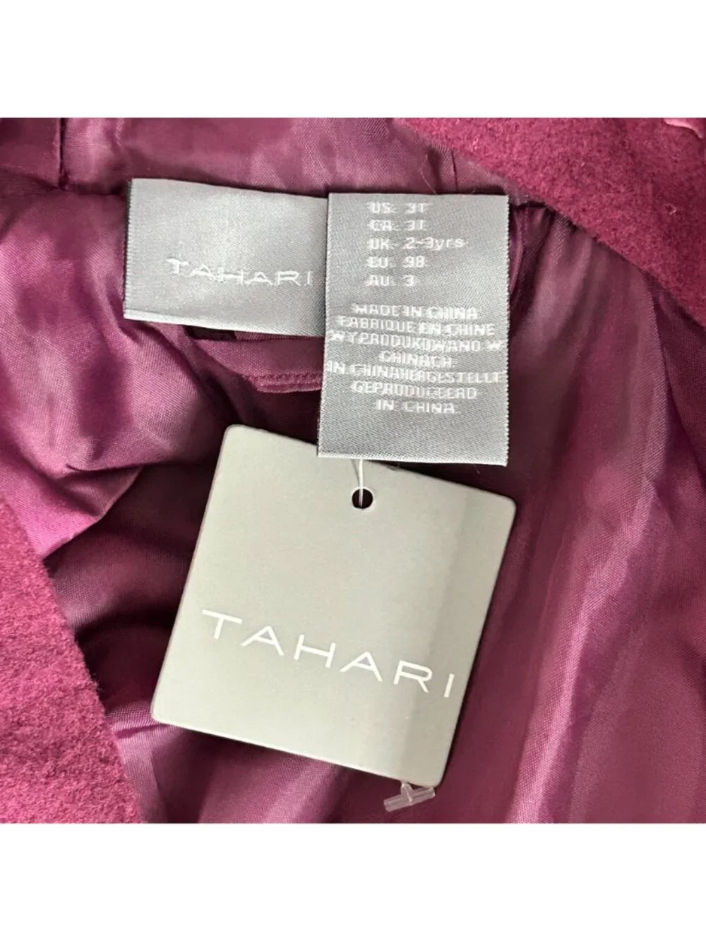 Tahari button front
